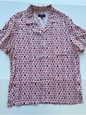 Naughty Santa moons and flips the bird. Fun party shirt! Men’s X-Large